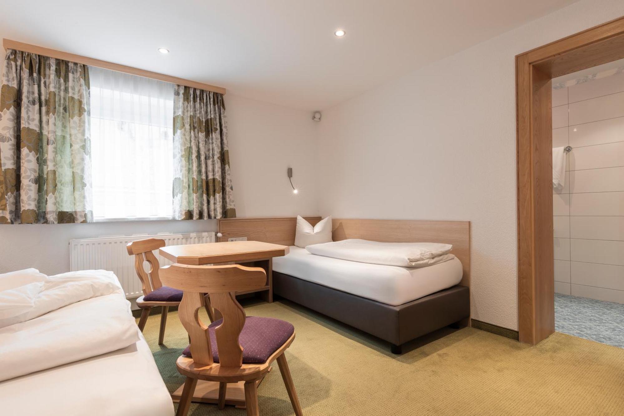 Schmid Rooms & Apartments Ишгль Экстерьер фото